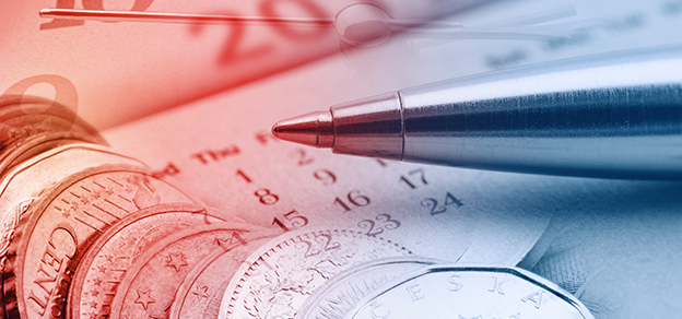 image with calendar, coins and a pen related to economic calendars for forex trading