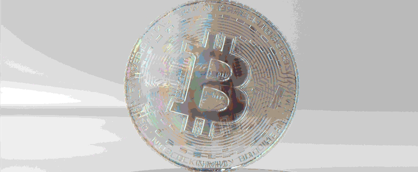 A spinning Bitcoin symbol, representing the dynamic nature of cryptocurrency CFDs.