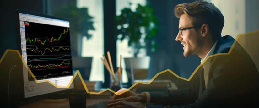 Un homme en costume examine l’écran d’un ordinateur affichant un graphique, montrant une concentration sur l’analyse des données.